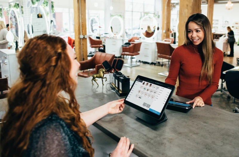 A transaction at a point-of-sale system in a retail small business setting.